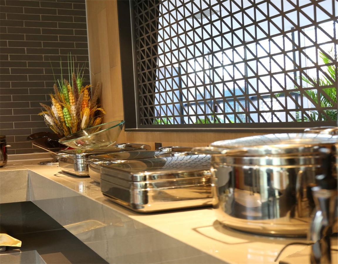 Qiu Guo Hotel Hua Mao Chaoyang  Extérieur photo