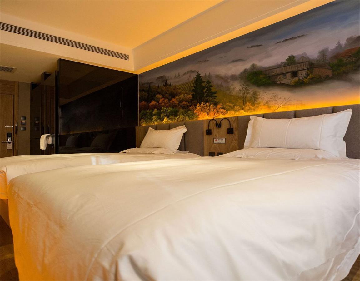 Qiu Guo Hotel Hua Mao Chaoyang  Extérieur photo
