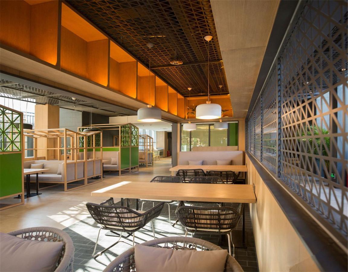 Qiu Guo Hotel Hua Mao Chaoyang  Extérieur photo