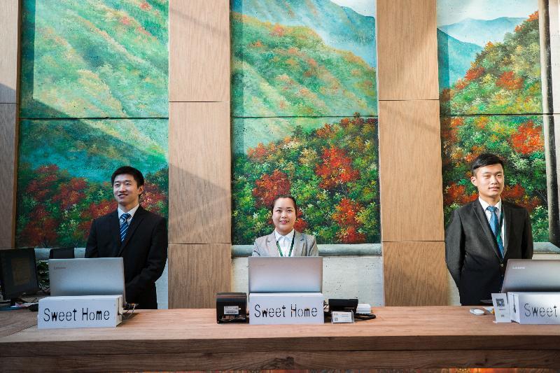Qiu Guo Hotel Hua Mao Chaoyang  Extérieur photo