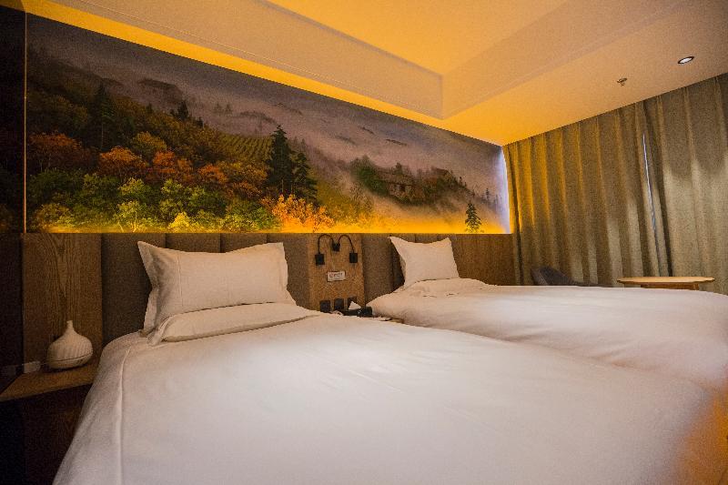 Qiu Guo Hotel Hua Mao Chaoyang  Extérieur photo